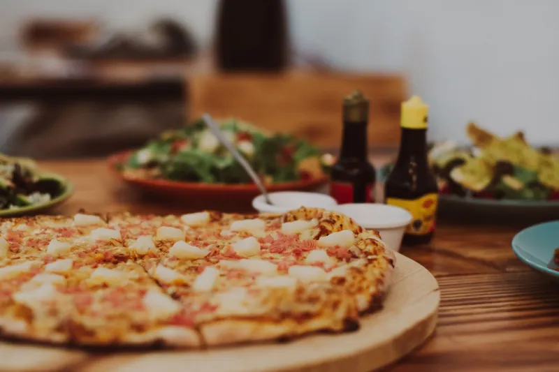 Sweet, Tangy, and Absolutely Unhinged: The Real Reason Pineapple Pizza Breaks the Internet Every Time
